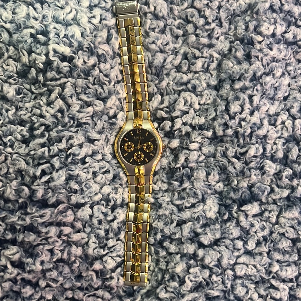 gold and silver Rosra watch (batteries not included)